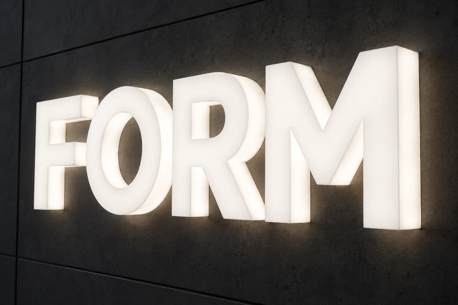 Full-lit opal acrylic FORM letters with both front faces and deep side surfaces illuminated