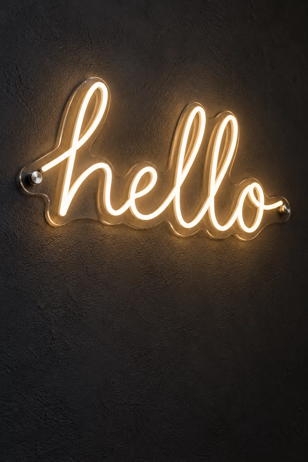 Warm white hello LED neon sign on a clear contour-cut acrylic backplate