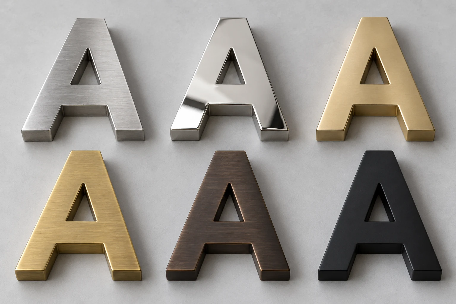 Six metal A samples showing brushed silver, mirror silver, champagne gold, brass, bronze and matte black finishes